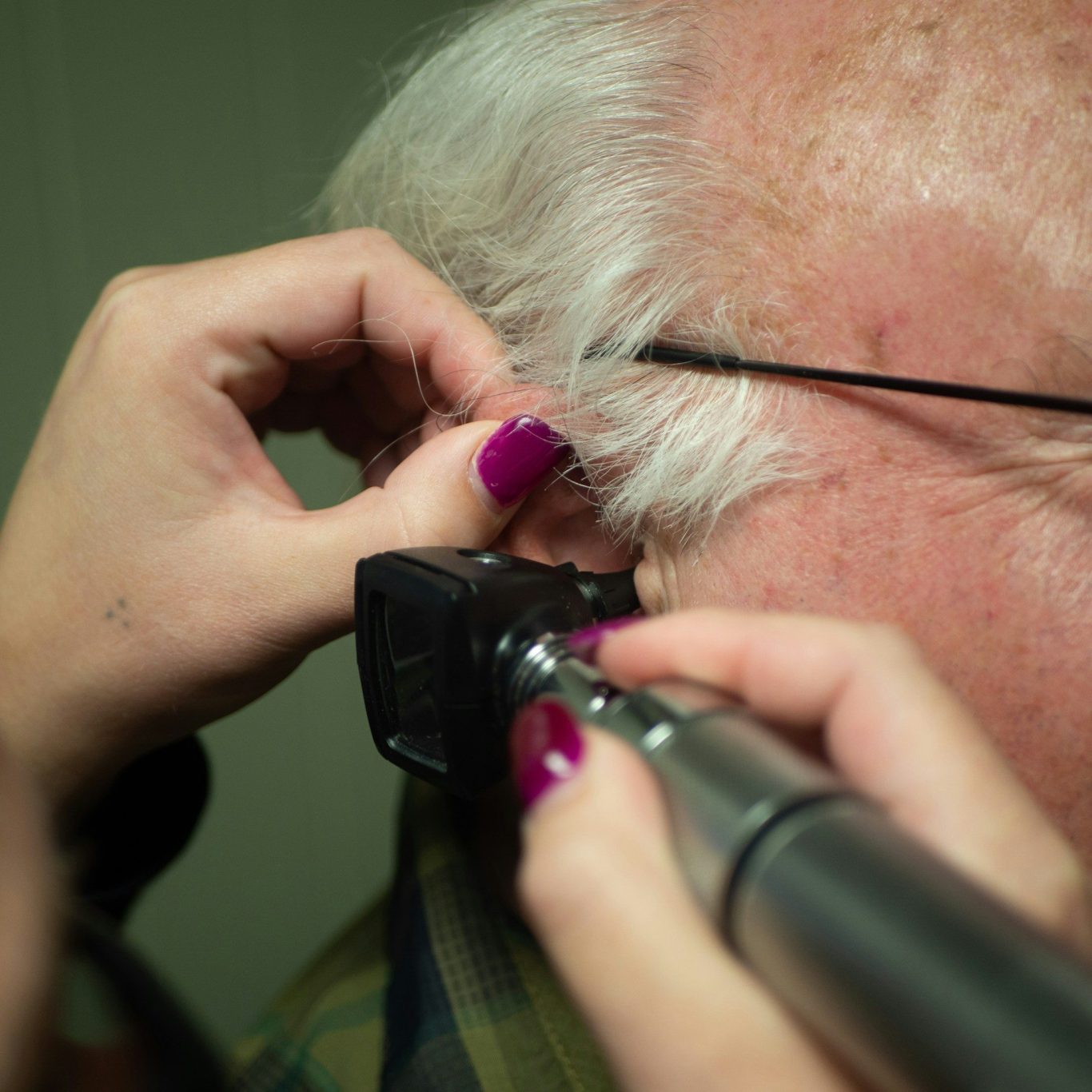 Otoscope Ear Wax being check with Otoscope